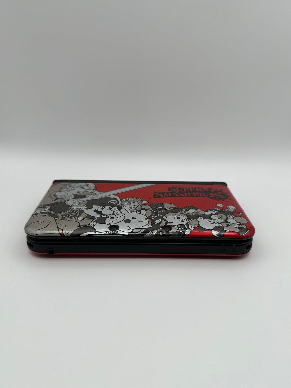 Nintendo 3DS XL in Rot im Super Smash Bros. Design, Zustand S – Produktfoto 7