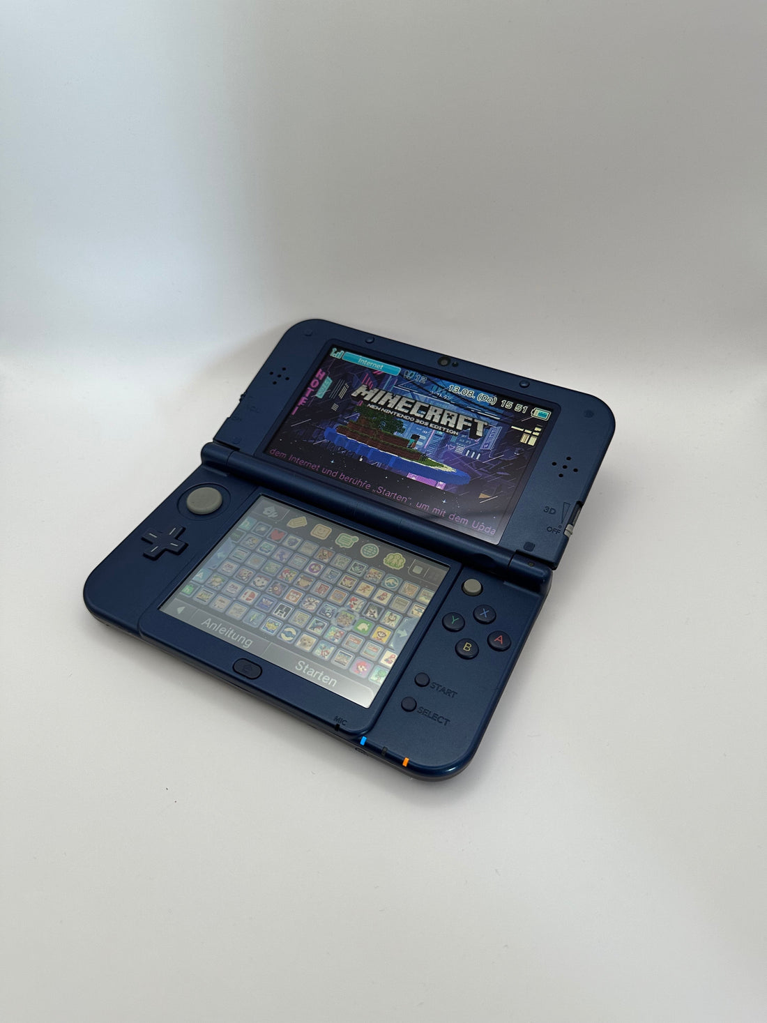 ReCollected New Nintendo 3DS XL Galaxy edition handheld console with Minecraft game displayed on the top screen
